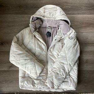 Vuori cream jacket size small, gently used /grt condition